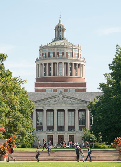 An exterior view of Rush Rhees library from Eastman Quad.