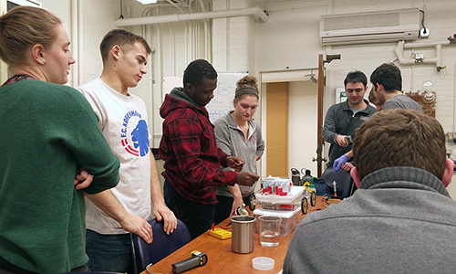 Students working on the car.