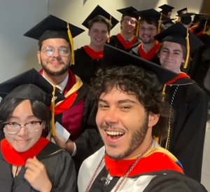 Graduates smiling at camera