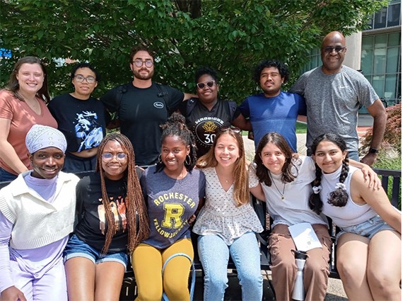 group looking at camera smiling