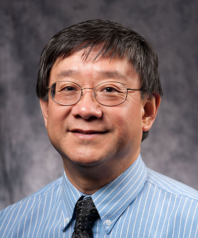 Headshot of Xi Cheng Zhang.