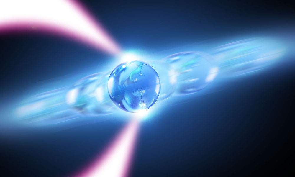 Rochester researchers are trapping nanoparticle-sized silica beads in an “optical tweezer” in a series of experiments that could shed new light on the fundamental properties of lasers–and perhaps lead to better sensors and other devices. (University illustration / Michael Osadciw)