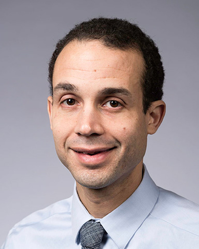 Headshot of Mark Buckley.