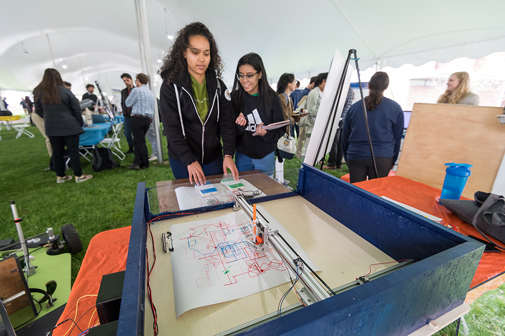 Students interact with the Mary Cariola Accessible Drawing Device.