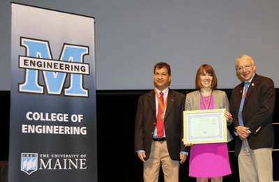 From left to right: Professor Hemant Pends, Professor Danielle Benoit, Dean Dana Humphrey