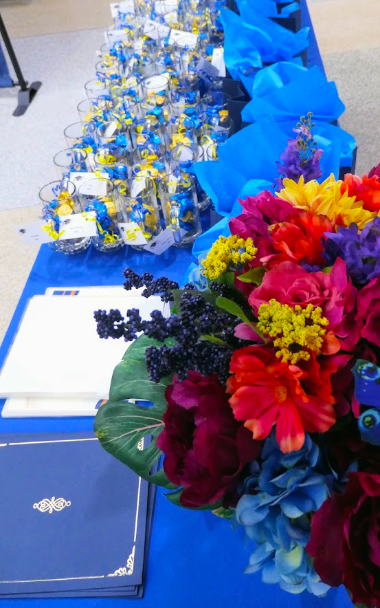 Flowers and awards on a banquet table