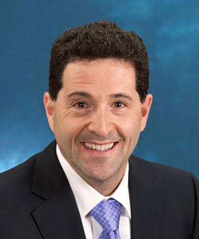Headshot of Edward M. Schwarz.