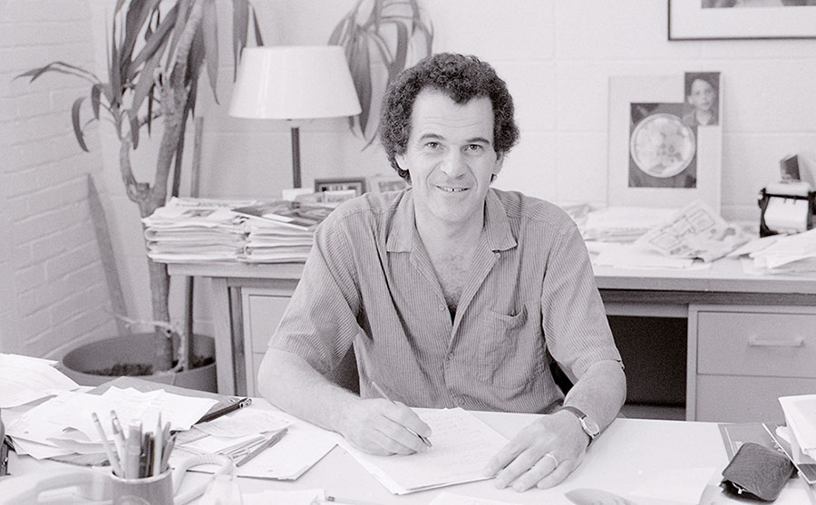 Jacob Jorne sitting at his desk.