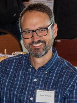 Joshua Munger smiling.