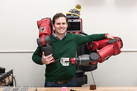 Professor Tom Howard with robot arms.