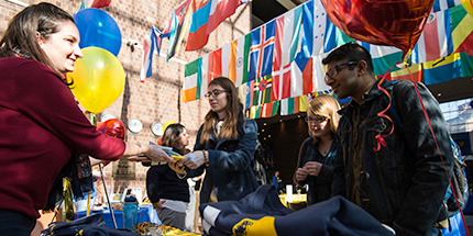 Students making purchases at "I Heart Rochester" Day.