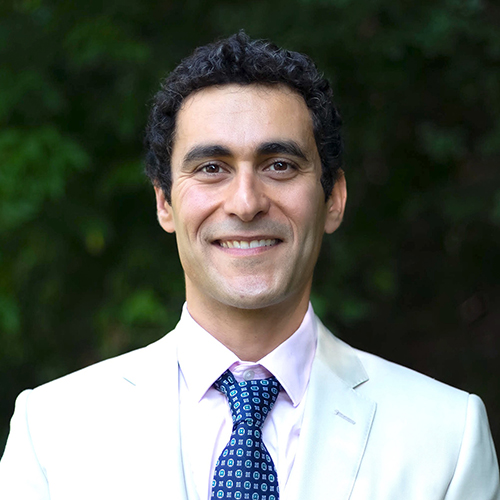 Headshot of Hussein Aluie.