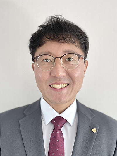 Nam's headshot.