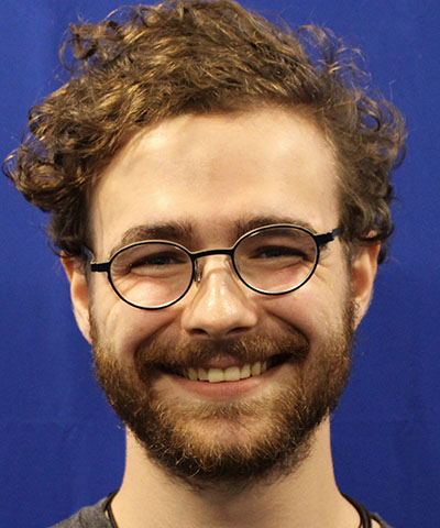 Headshot of Alexander Prideaux.