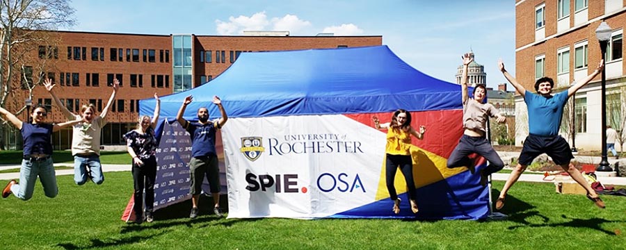 Group photo in front of the SPIE tent.