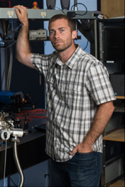 Professor Nick Vamivakas in his lab