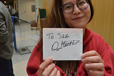 Sze Wah Lee with her autograph of Donna Strickland.
