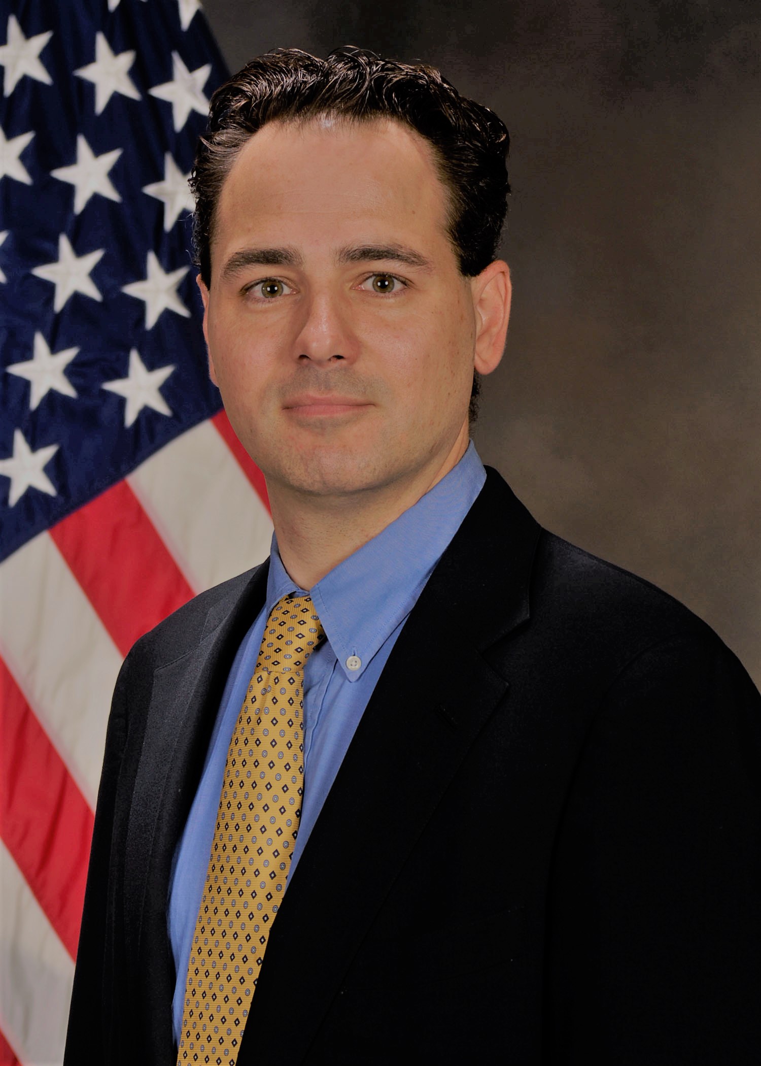 Headshot of Usechak.
