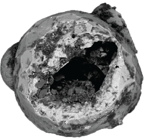 scanning electron image of an industrially produced particle with an interior cavity