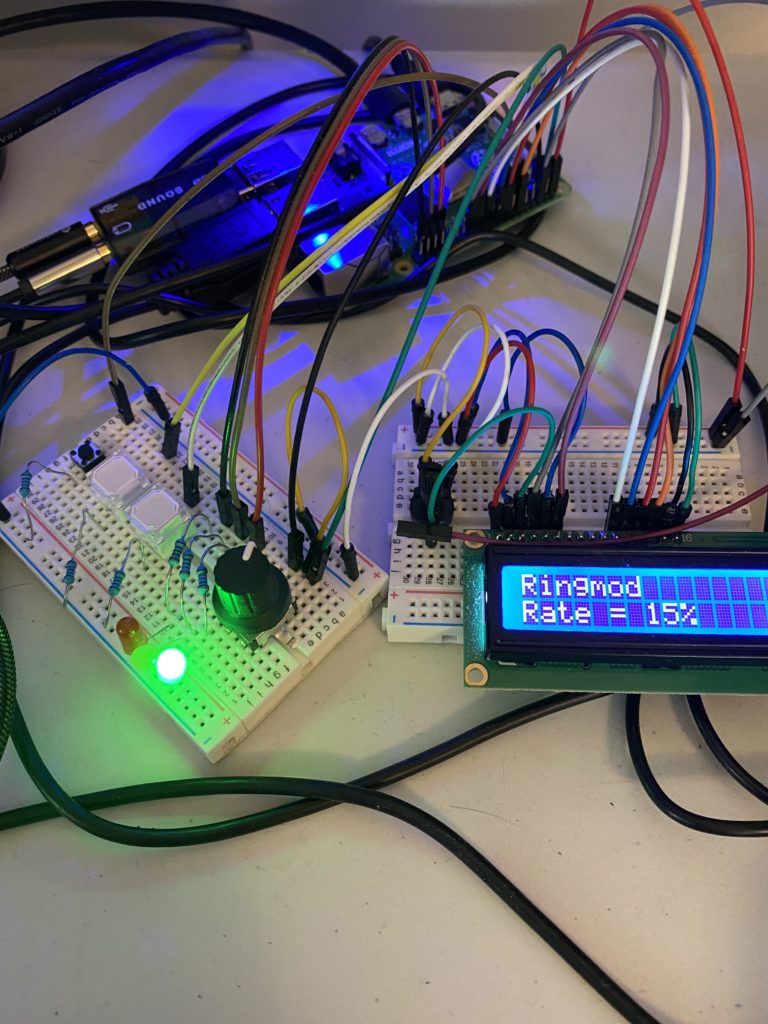 Image of knob, buttons, LEDs, and pedal screen connected to Raspberry Pi